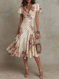 Printed V-neck Defined Waistline Ruffled Hem Dress Gronata