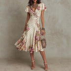 Printed V-neck Defined Waistline Ruffled Hem Dress Gronata